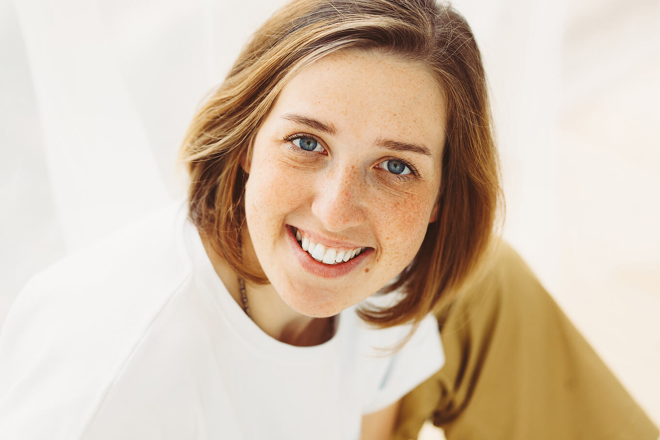Portrait,Of,Attractive,Smiling,Young,Woman,With,Red,Bob,Hair
