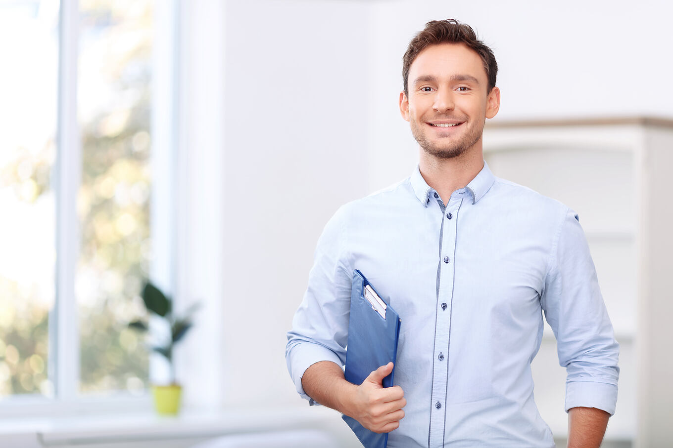 Ready,To,Sale.,Pleasant,Cheerful,Handsome,Realtor,Holding,Folder,And