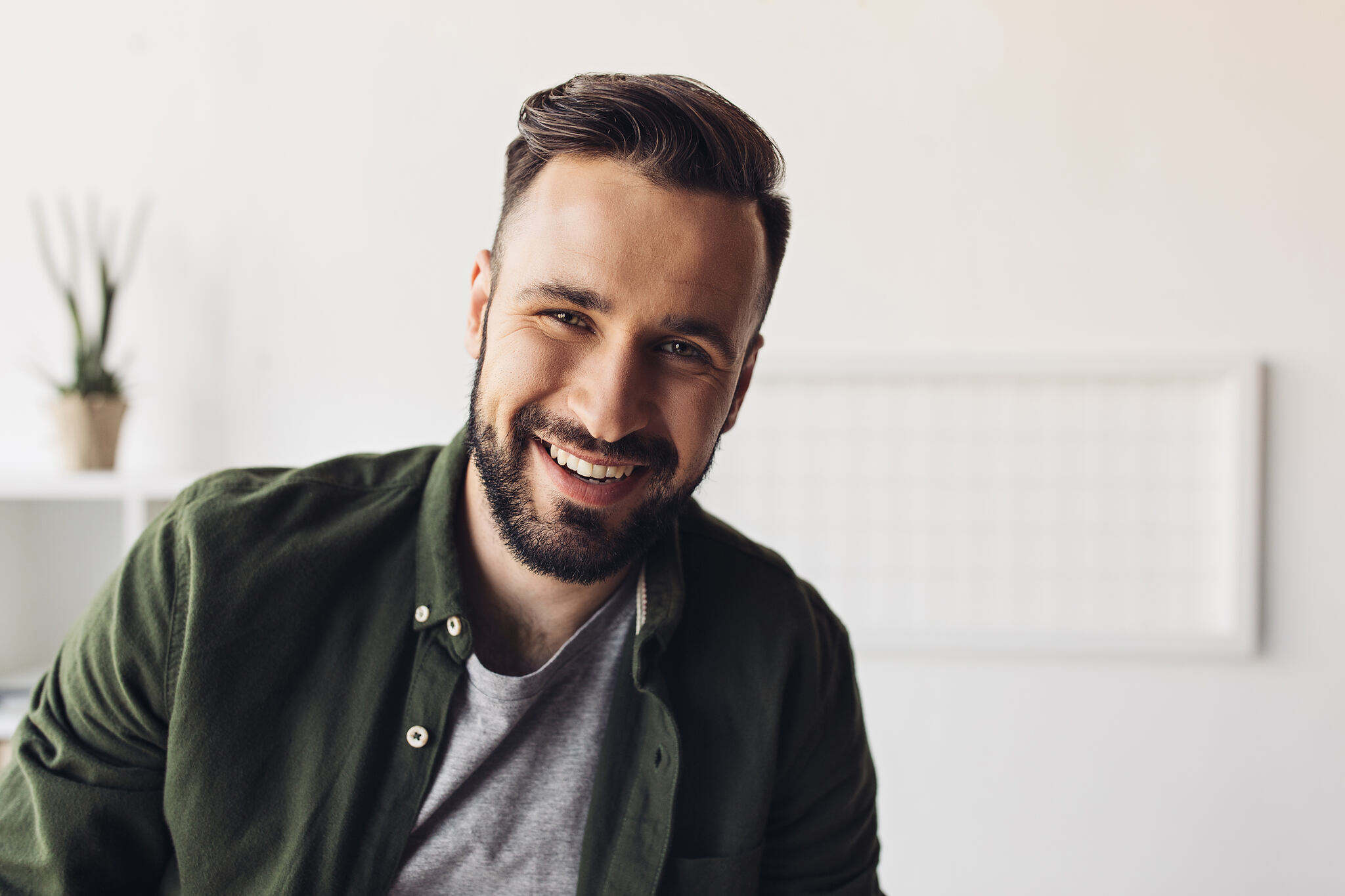 Close-up,Portrait,Of,Handsome,Bearded,Man,Smiling,At,Camera