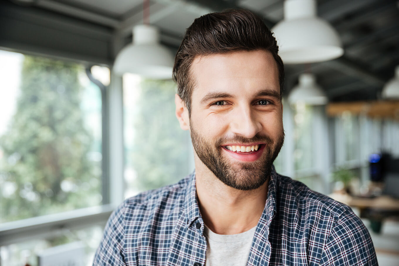 Picture,Of,Young,Happy,Man,Standing,In,Office,Coworking.,Looking