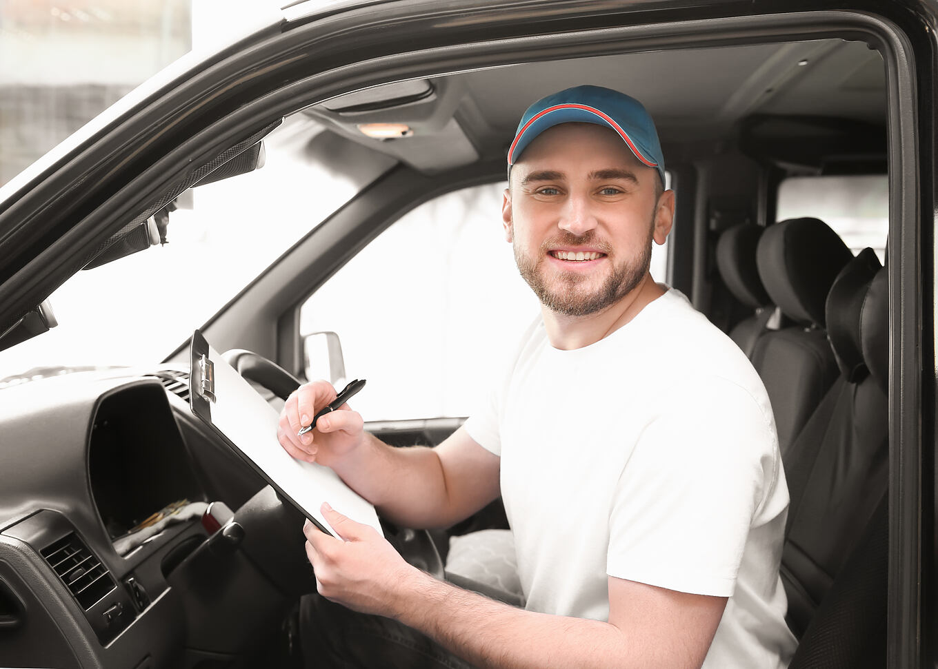 Handsome,Delivery,Man,Sitting,In,Car
